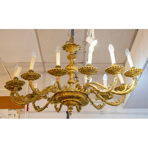 224 - CHANDELIER, 114cm x 80cm x 113cm H including chain, 20th century Spanish cast brass of twelve lights... 