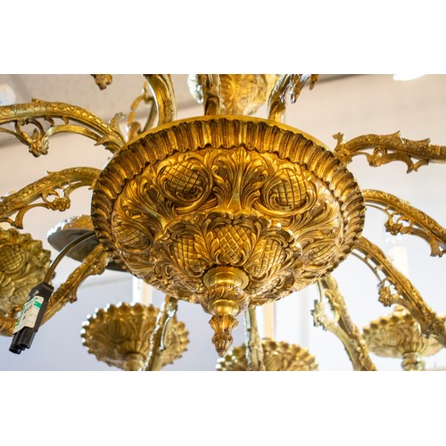 224 - CHANDELIER, 114cm x 80cm x 113cm H including chain, 20th century Spanish cast brass of twelve lights... 