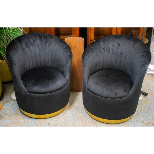 283 - SWIVEL TUB CHAIRS, 85cm H x 76cm, a pair, black velvet on brass bases. (2)