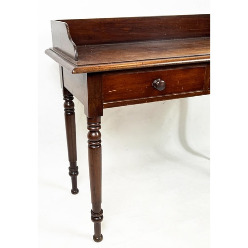 168 - WRITING TABLE, 91cm H x 112cm W x 52cm D, Victorian mahogany with 3/4 gallery and two drawers.