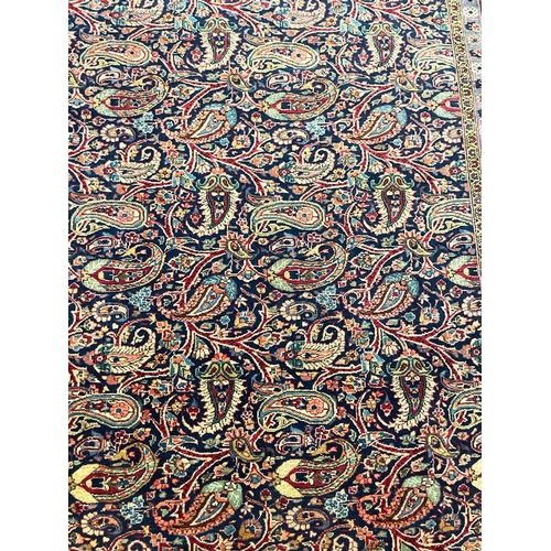 100 - ANTIQUE PAISLEY DESIGN KASHAN CARPET, 266cm x 183cm.