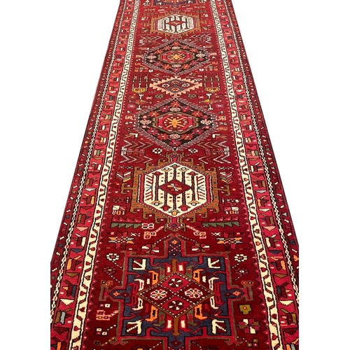 99 - PERSIAN KARAJA LONG RUNNER, 485cm x 90cm.