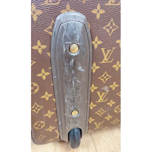 195 - LOUIS VUITTON PEGASE TROLLEY, monogram coated canvas with leather side and top handles, top ring for... 