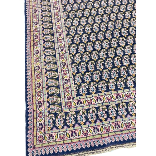 101 - ANTIQUE INDIAN AMRITSAR RUG, 219cm x 167cm.