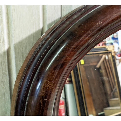 108 - OVERMANTEL MIRROR, 160cm H x 182cm, Victorian with an arched mahogany frame.