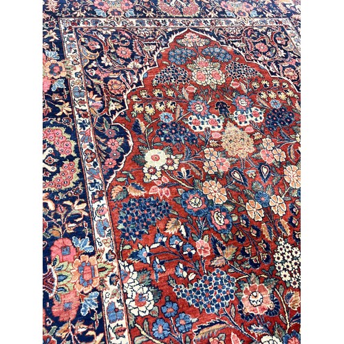 101A - ANTIQUE KASHAN RUG, 196cm x 130cm.