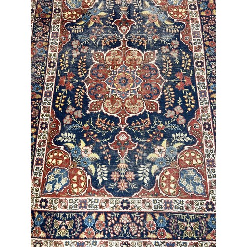 102A - ANTIQUE PERSIAN RUG, 185cm x 134cm.