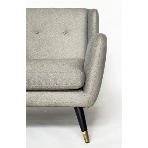 302 - HOOPER ARMCHAIR, 1960's style with silver grey upholstery and outswept brass capped supports, 83cm W... 