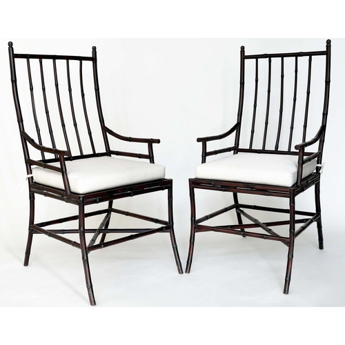 143 - BAMBOO ARMCHAIRS, a pair, verandah style stained bamboo each with high rail back and cotton cushion,... 