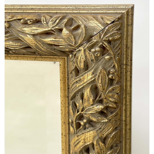 148 - WALL MIRROR, rectangular gilt composition with bevelled mirror and foliate and strap frame, 'Skopos,... 