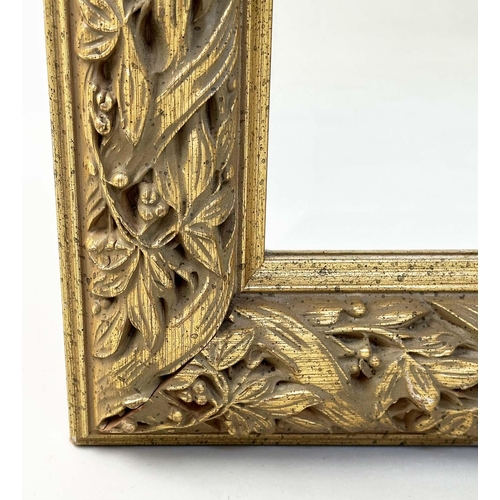 148 - WALL MIRROR, rectangular gilt composition with bevelled mirror and foliate and strap frame, 'Skopos,... 