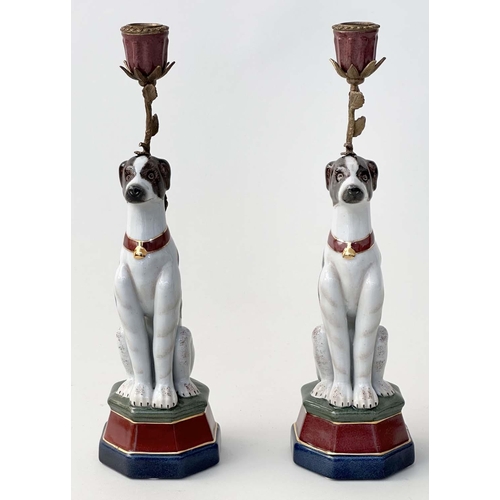 151 - DOG CANDLESTICKS, a pair, Continental style ceramic painted and gilt metal mounted. (2)