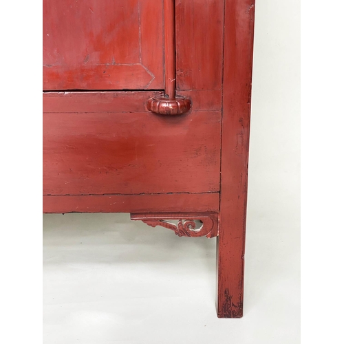 321 - MARRIAGE CABINET, 19th century Chinese scarlet lacquered with two panelled doors enclosing hanging, ... 