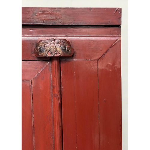 321 - MARRIAGE CABINET, 19th century Chinese scarlet lacquered with two panelled doors enclosing hanging, ... 