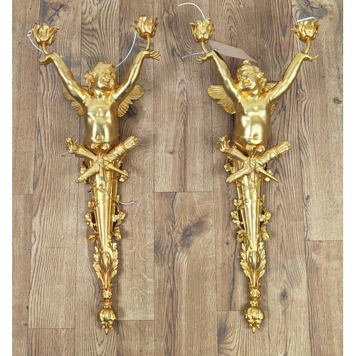 355 - WALL LIGHTS, a pair, 74cm each French Rococo style, cherub form, gilt finish. (2)