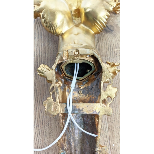 355 - WALL LIGHTS, a pair, 74cm each French Rococo style, cherub form, gilt finish. (2)