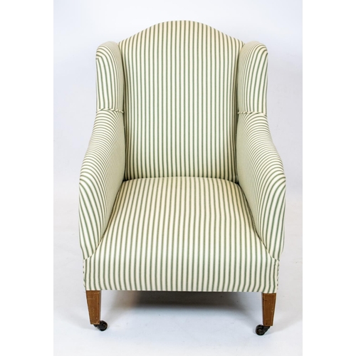 177 - ARMCHAIR, 88cm H x 61cm W, Edwardian in new green ticking on steel castors.