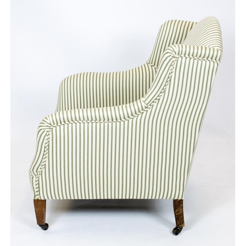 177 - ARMCHAIR, 88cm H x 61cm W, Edwardian in new green ticking on steel castors.