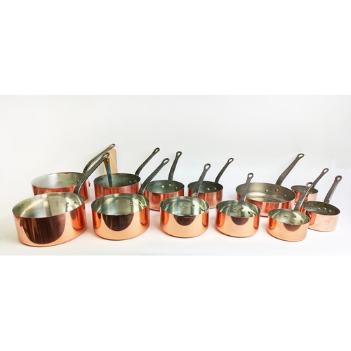 162 - BATTERIE DE CUISINE, comprising of a graduated set of five copper pans, the largest 20cm diam, anoth... 