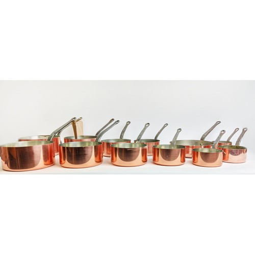 162 - BATTERIE DE CUISINE, comprising of a graduated set of five copper pans, the largest 20cm diam, anoth... 