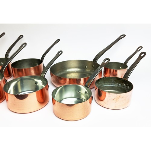 162 - BATTERIE DE CUISINE, comprising of a graduated set of five copper pans, the largest 20cm diam, anoth... 