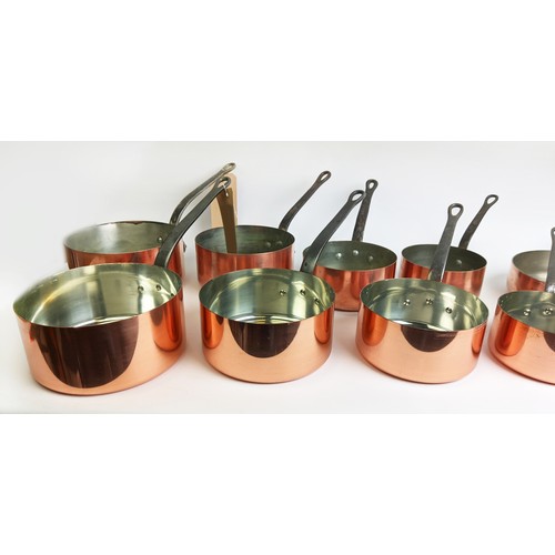 162 - BATTERIE DE CUISINE, comprising of a graduated set of five copper pans, the largest 20cm diam, anoth... 