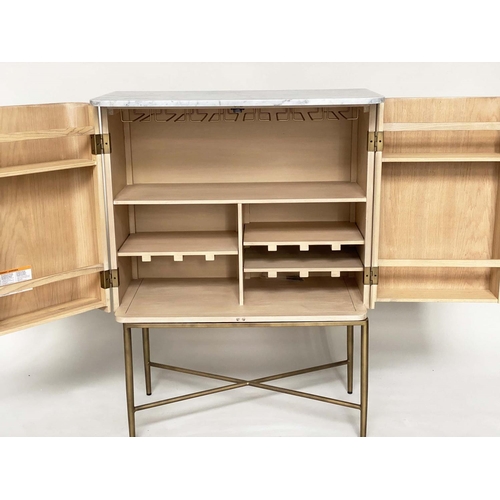 350 - COCKTAIL CABINET, faux bamboo with two shaped and fitted doors, fitted interior and gilt metal suppo... 