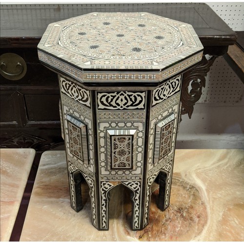 446 - OCTAGONAL OCCASIONAL TABLE, 36cm x 52cm H, Damascus style with inlaid detail.