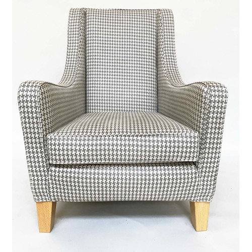 473 - ARMCHAIR BY DESIGNERS GUILD, slender wing back and sloping arms in Designers Guild dogtooth linen we... 