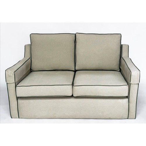 486 - SOFA, two seater, Classical form in green piped woven linen, 1450cm W.