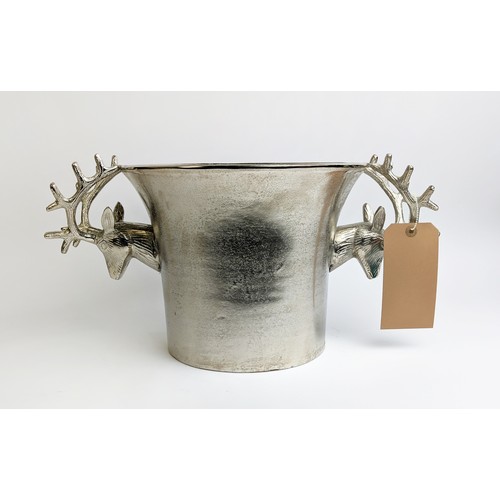 396 - CHAMPAGNE BATH, stage head twin handles, silver tone, 24cm H x 48cm W.