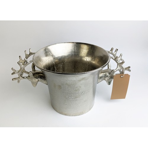 396 - CHAMPAGNE BATH, stage head twin handles, silver tone, 24cm H x 48cm W.