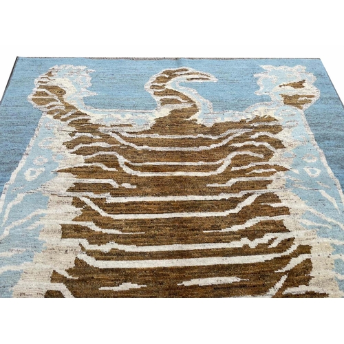 172 - FINE TIBETAN TIGER CARPET, 285cm x 202cm.