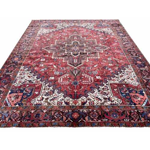 179 - PERSIAN HERIZ CARPET, 333cm x 268cm.