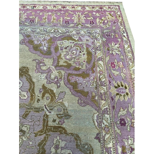 191 - ANTIQUE AMRITZA CARPET, 340cm x 265cm.