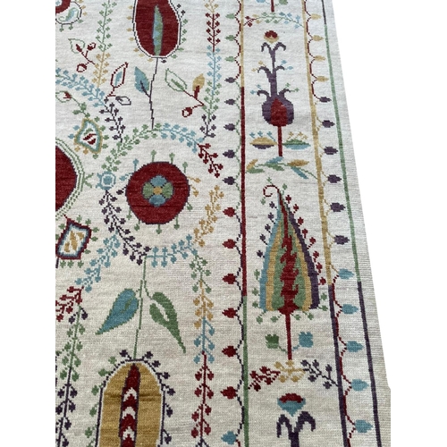 193 - FINE SUZANI DESIGN CARPET, 303cm x 203cm.