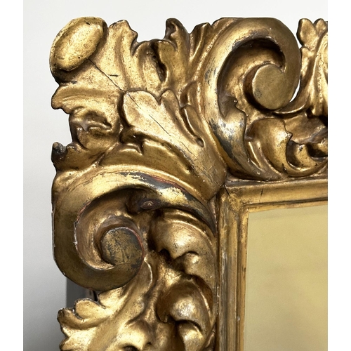 216 - FLORENTINE WALL MIRROR, 19th century Italian Florentine carved giltwood cushion pierced frame and be... 