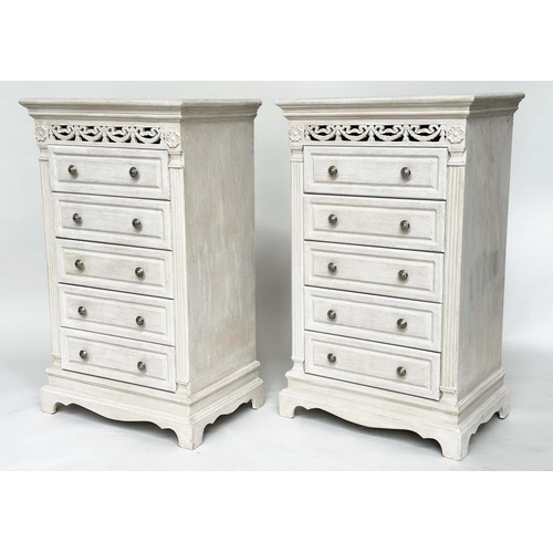 223 - CHESTS, a pair, French traditionally grey painted each with pierced frieze and five long drawers, 60... 