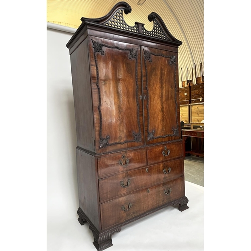 228 - LINEN PRESS, 18th century George III figured mahogany with swan neck cornice, carved panelled doors ... 