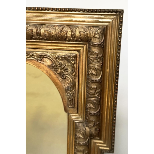 237 - OVERMANTEL MIRROR, late 19th century giltwood and composition rectangular with arched and beaded fra... 