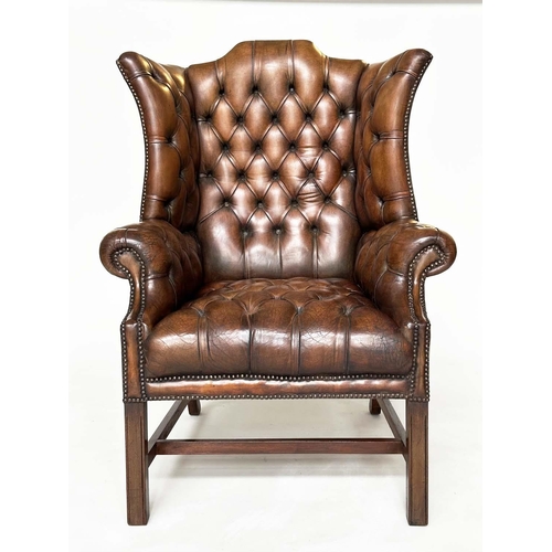 259 - WING ARMCHAIR, George III design mahogany with deep buttoned, nicely aged, mid brown tan hide leathe... 