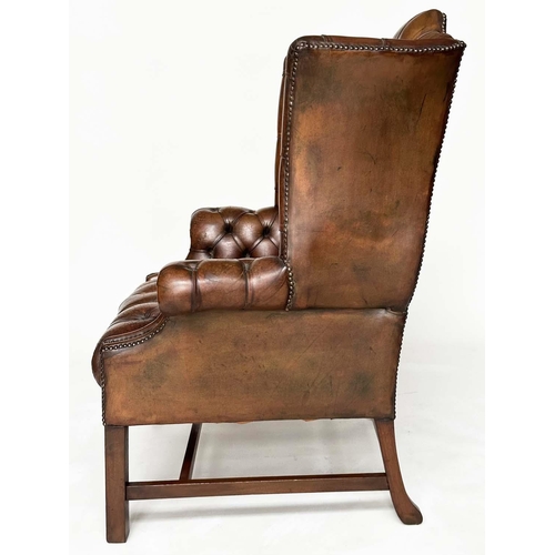 259 - WING ARMCHAIR, George III design mahogany with deep buttoned, nicely aged, mid brown tan hide leathe... 