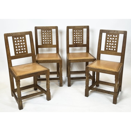 345 - ROBERT 'MOUSEMAN' THOMPSON DINING CHAIRS, a set of four, circa 1930, oak with tan leather seats. (4)