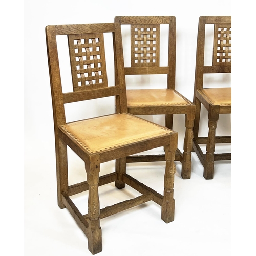 345 - ROBERT 'MOUSEMAN' THOMPSON DINING CHAIRS, a set of four, circa 1930, oak with tan leather seats. (4)