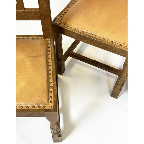 345 - ROBERT 'MOUSEMAN' THOMPSON DINING CHAIRS, a set of four, circa 1930, oak with tan leather seats. (4)