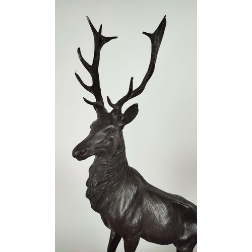 364 - AFTER J MOLGNIES, a pair of stags, cast metal, stone bases, 75cm H. (2)