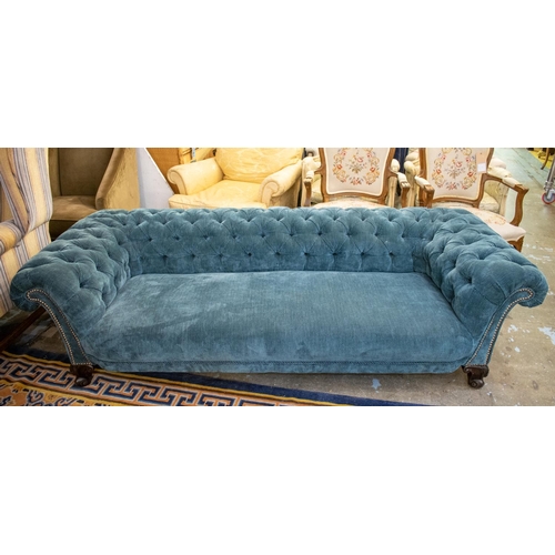 380 - CHESTERFIELD SOFA, 56cm H x 214cm x 90cm, Victorian, of low height in buttoned blue chenille.