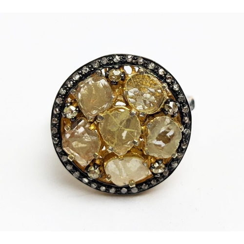 43 - AN UNUSUAL MIXED CUT DIAMOND CLUSTER RING, with rose cut diamond centre surrounded by five further d... 