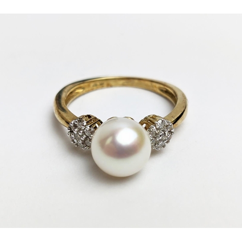 49 - A 9CT GOLD SINGLE CULTURED PEARL SET DRESS RING, with daisy set diamond cluster shoulders, the diamo... 