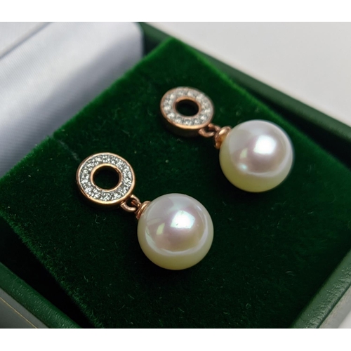 50 - A PAIR OF 9CT GOLD CULTURED PEARL AND DIAMOND DROP EARRINGS, the pearls of 8mm diameter, complete wi... 